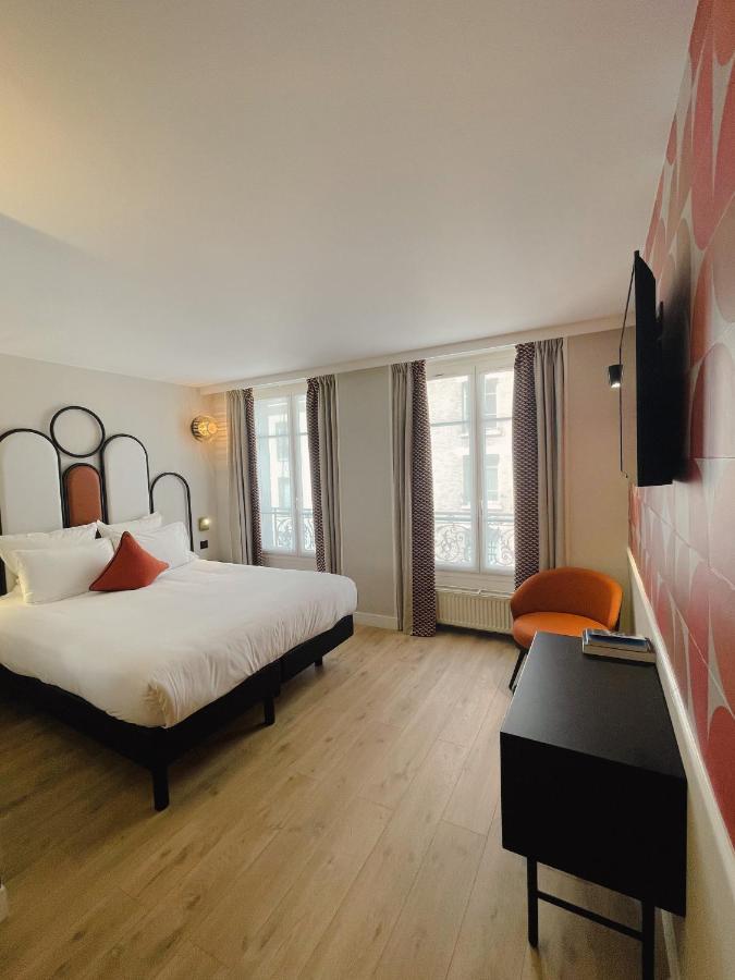 โรงแรมเดอ เลสเปอร็องซ์ ปารีส ภายนอก รูปภาพ